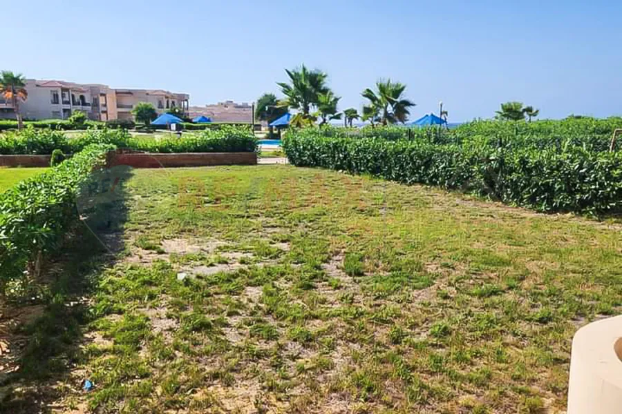شاليه ارضي + جاردن للبيع (كورال هيلز - رأس الحكمه) 65 م