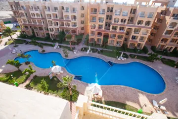 شاليه للبيع 85 م +25 م حديقة الساحل الشمالي (قرية اجورا ك 128)