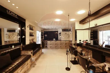 محل  للبيع  130 م + ميزان 120 م  سيدي بشر  (هيلتون رمادا)