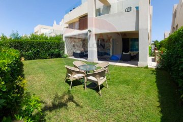 Ground floor chalet with garden for sale (Hacienda Bay - Sidi Abdel Rahman) 170 m + 164 m garden - 14,000,000 EGP
